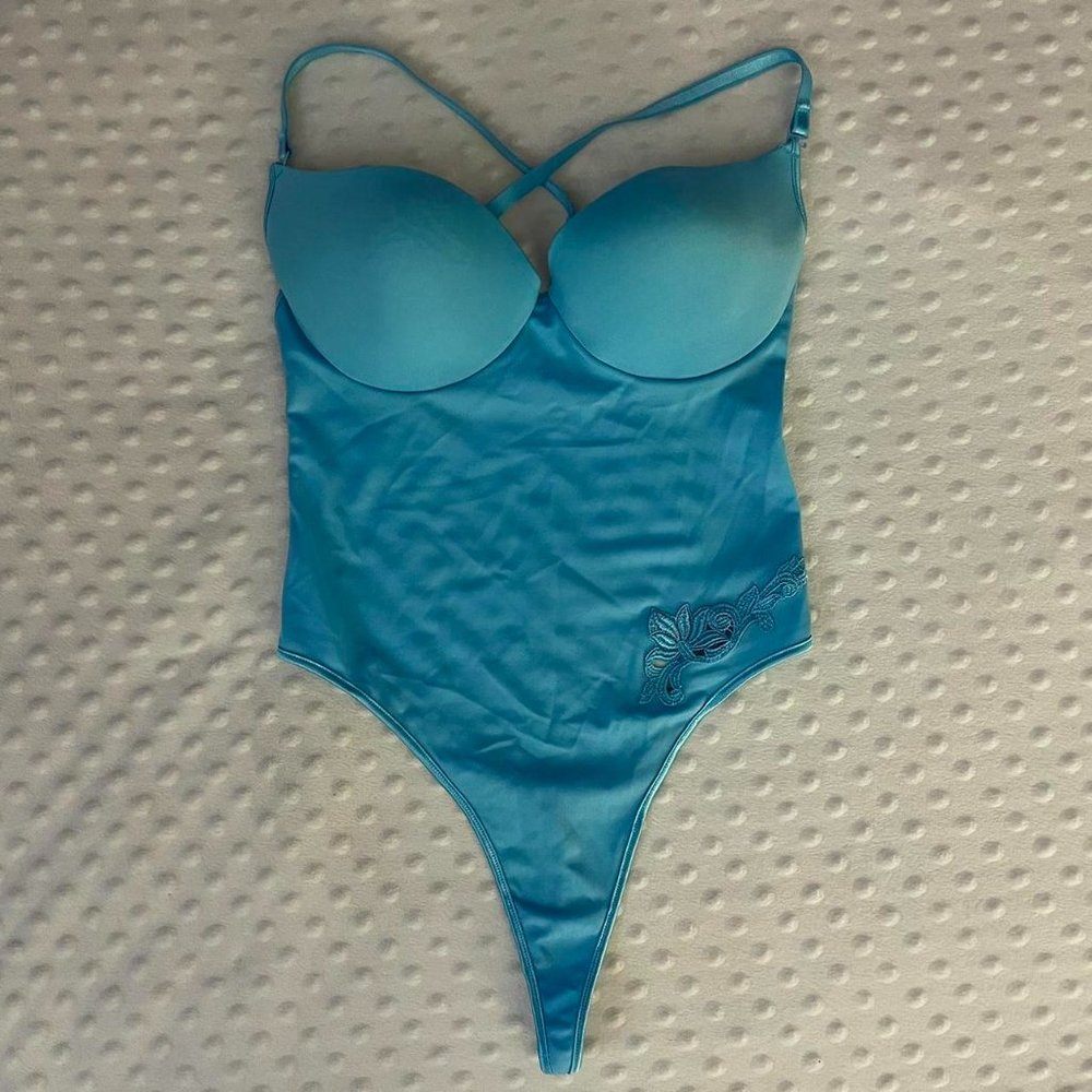 NWOT blue g string bodysuit size 36B
